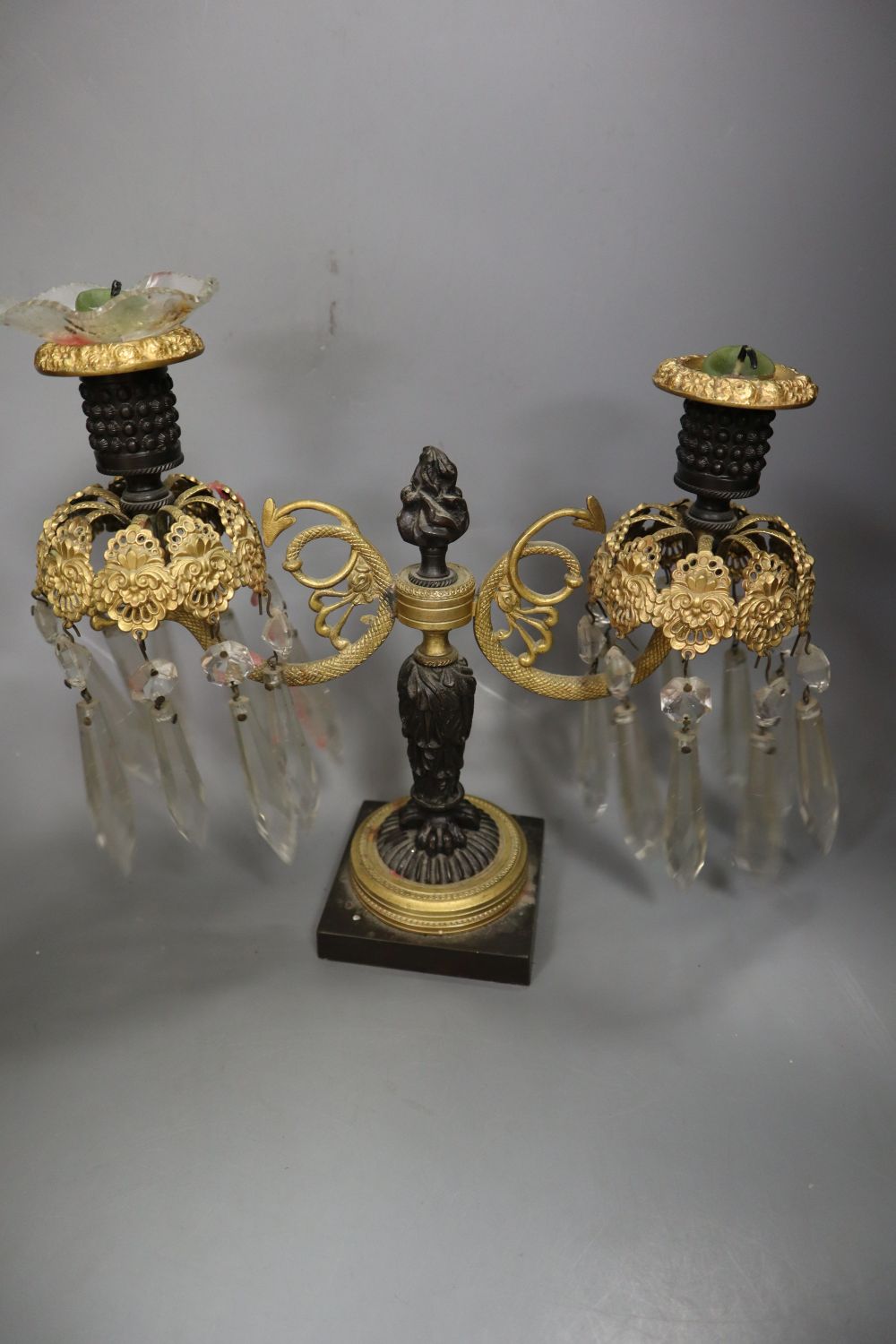 A pair of Regency two branch two light lustres, width 27cm, and a miniature bust